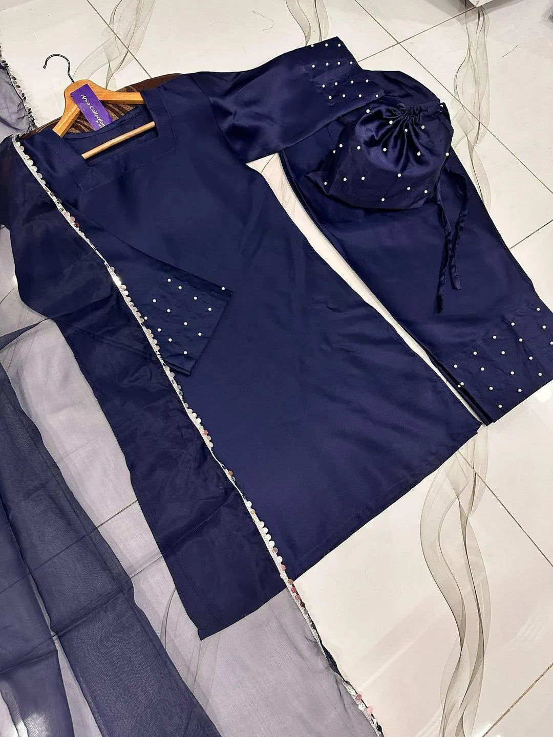 Blue shamoz silk 4 piece suit for women with farshi shalwar dupatta and potli elegant festive wear outfit