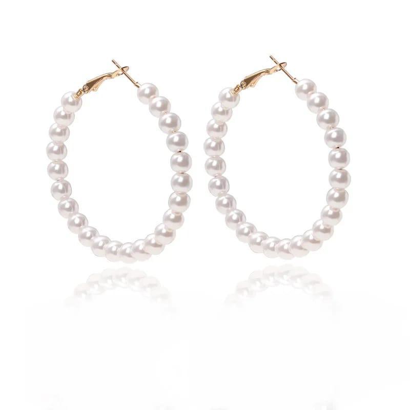 Elegant white pearl hoop earrings with gold-toned hooks for women