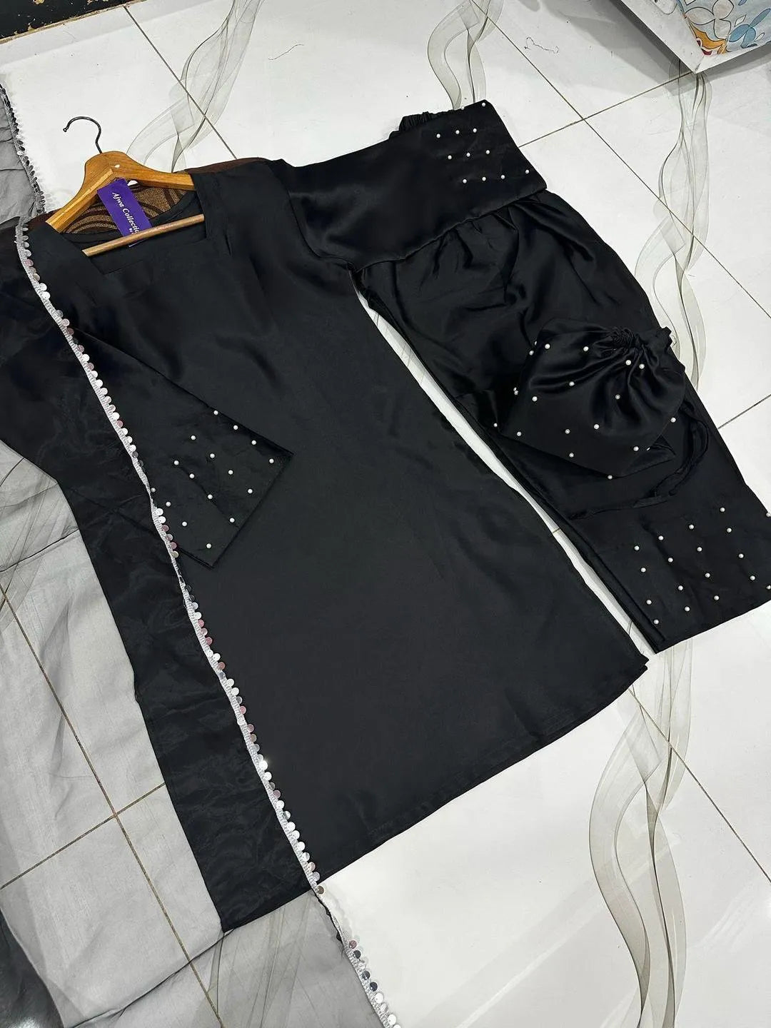 Black shamoz silk 4 piece suit for women with farshi shalwar dupatta and potli elegant festive wear outfit