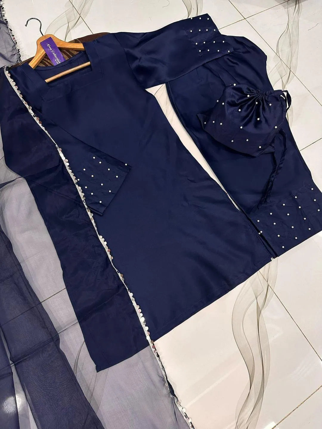 Blue shamoz silk 4 piece suit for women with farshi shalwar dupatta and potli elegant festive wear outfit