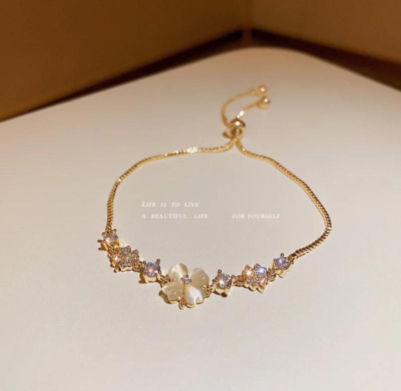 Gold plated flower charm bracelet women elegant jewelry Pakistan Swift Mart