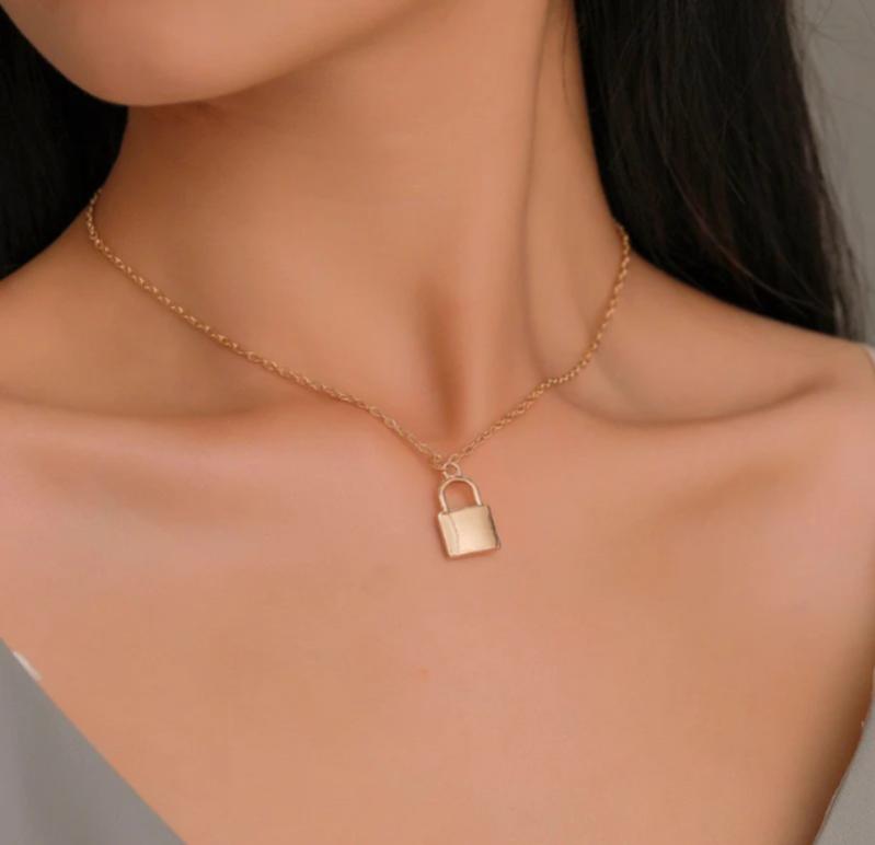 Gold lock pendant necklace for women elegant minimalist design