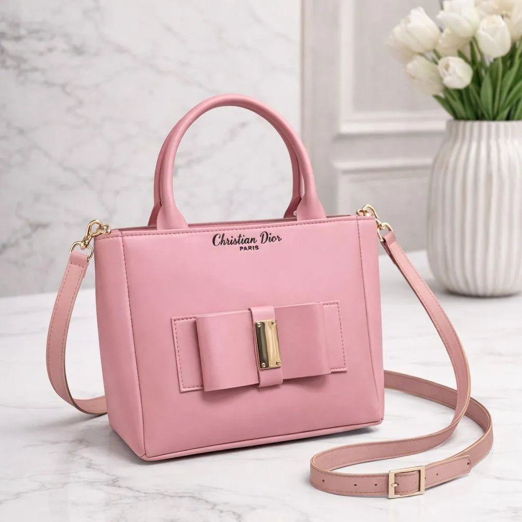 Leather shoulder bag for girls with bow design stylish compact handbag for school college and casual daily use