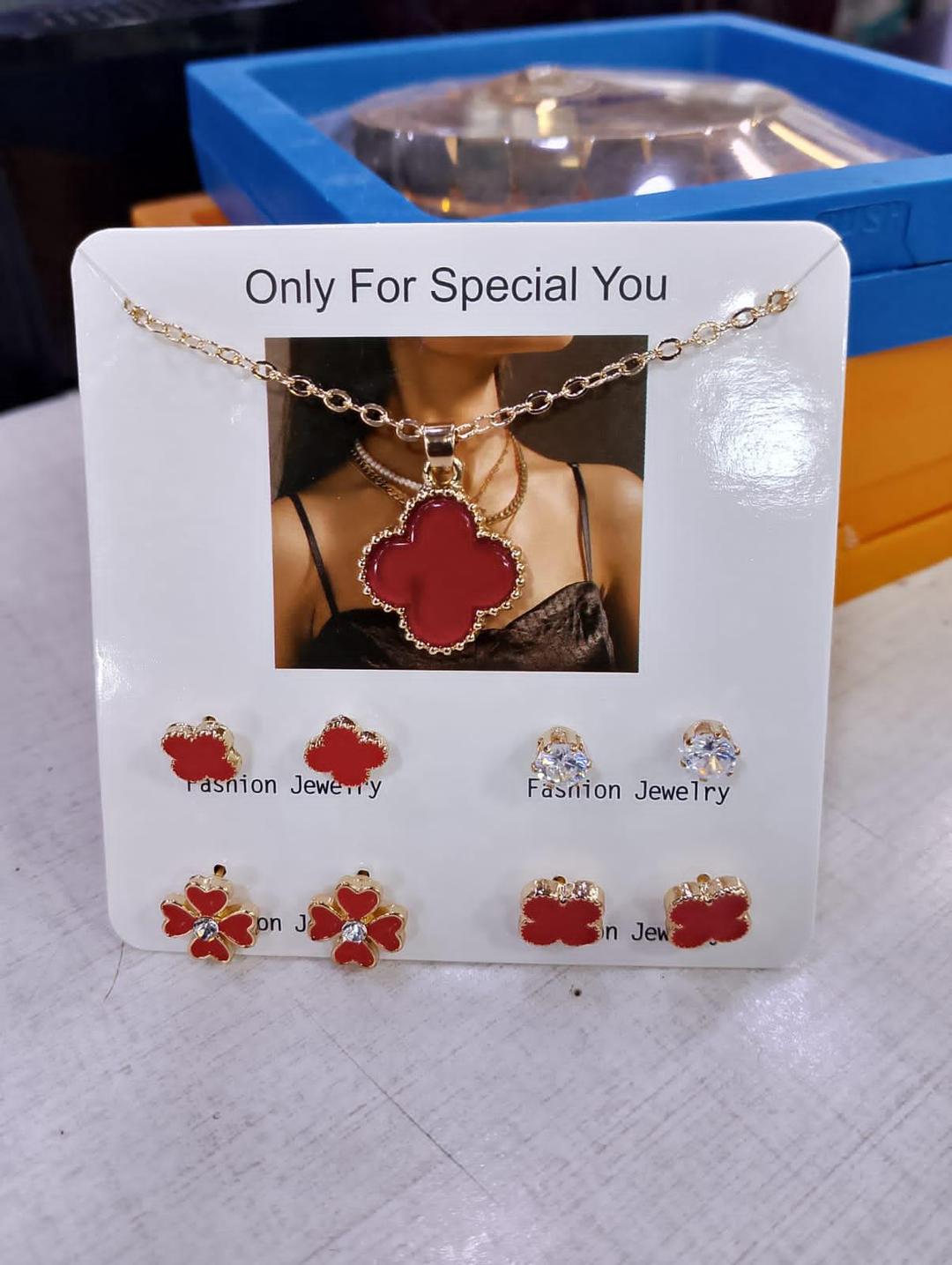 Elegant red enamel clover necklace and earrings set by SwiftMart women jewelry