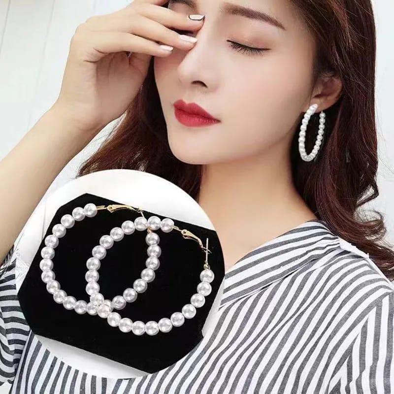Elegant white pearl hoop earrings with gold-toned hooks for women
